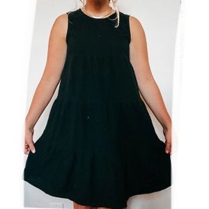 Black dress. No size. Fits a M/L.